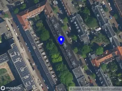 Ambulance met gepaste spoed naar de Krommeniestraat in Amsterdam