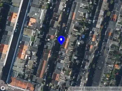 Ambulance met grote spoed naar de Generaal De la Reijstraat in Haarlem
