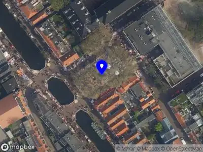 Ambulance met gepaste spoed naar de Doelenplein in Delft