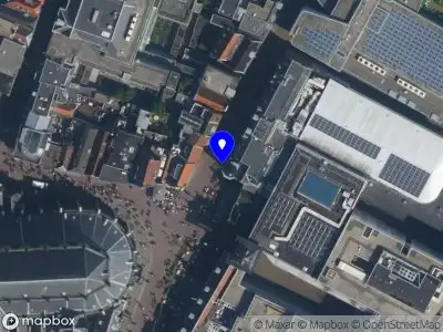 Ambulance met gepaste spoed naar de Klokhuisplein in Haarlem