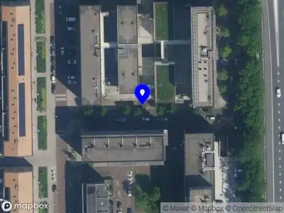 Ambulance met grote spoed naar de Alma Tademastraat in Amsterdam