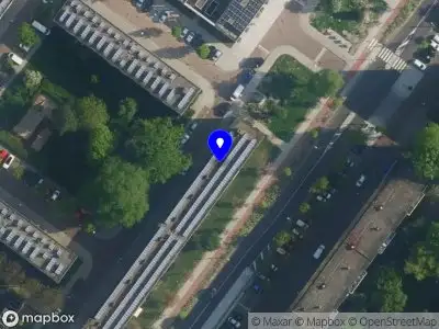 Ambulance met gepaste spoed naar de Treilerhof in Amsterdam