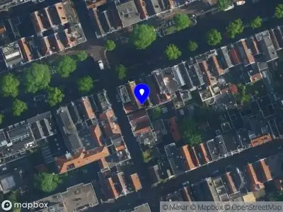 Ambulance met gepaste spoed naar de Rozengracht in Amsterdam