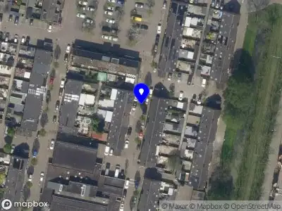 Ambulance met gepaste spoed naar de Arcenstraat in Rotterdam