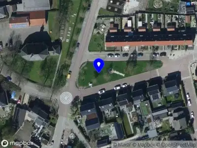 Ambulance met grote spoed naar de Koningin Emmaplein in Den Bommel