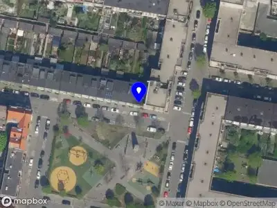 Ambulance met grote spoed naar de Frederikstraat in Rotterdam