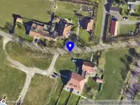 Ambulance met grote spoed naar de Looweg in Ballum