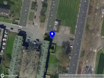 Ambulance met gepaste spoed naar de Bruinissestraat in Rotterdam