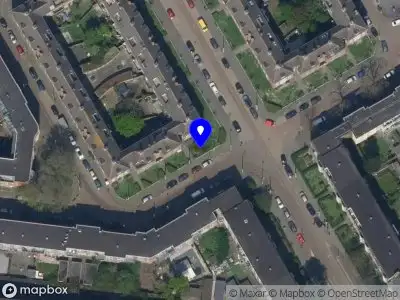 Ambulance met gepaste spoed naar de Huygensstraat in Rotterdam