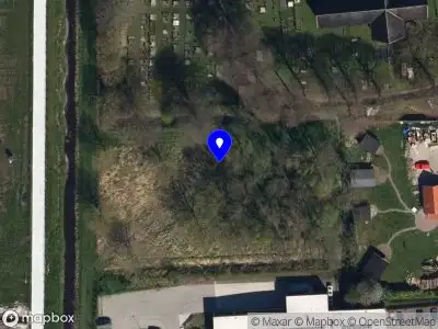 Ambulance en brandweer met gepaste spoed naar de Trekweg in Zuidbroek vanwege een buitenbrand
