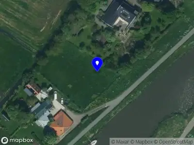 Brandweer met gepaste spoed naar de Purmerdijk M in Purmer vanwege een buitenbrand