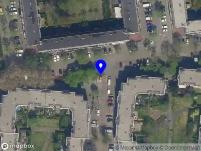 Ambulance met gepaste spoed naar de Veemarktstraat in Rotterdam
