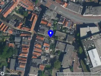 Ambulance met gepaste spoed naar de Groendaalsteeg in Haarlem