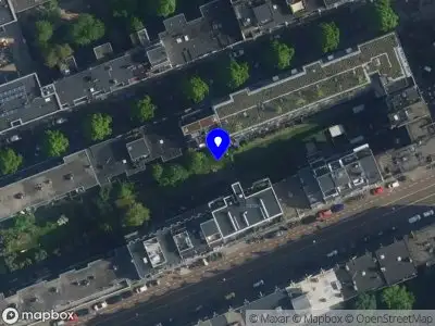 Ambulance met grote spoed naar de 's-Gravesandeplein in Amsterdam
