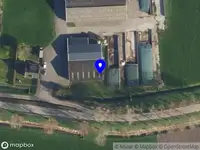 Brandweer met grote spoed naar de Grindweg naar Hontenisse in Ossenisse vanwege gebouwbrand