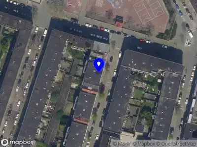 Ambulance met grote spoed naar de Bussinghstraat in Rotterdam