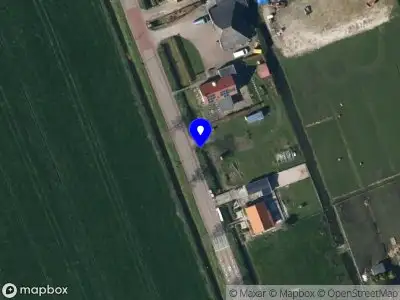 Brandweer met grote spoed naar de Beukenlaan in Oosterzee vanwege voertuigen te water