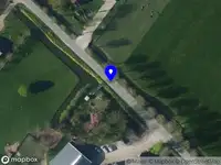 Ambulance met gepaste spoed naar de Grote Zomerdijk in Spanbroek