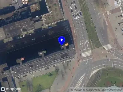 Ambulance met grote spoed naar de Weena in Rotterdam