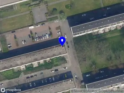 Ambulance met gepaste spoed naar de Kramerstraat in Rotterdam