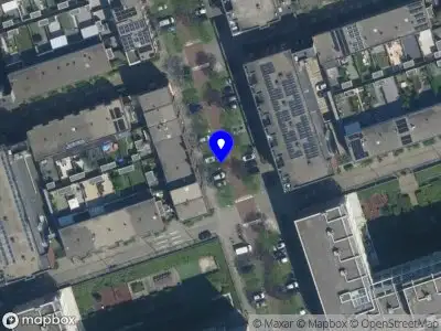 Ambulance met grote spoed naar de Dr. E. Boekmanstraat in Amsterdam