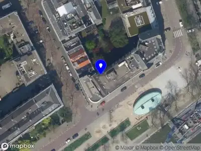 Ambulance met grote spoed naar de Westerkade in Rotterdam