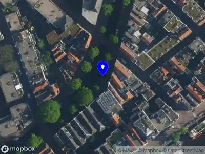 Ambulance met gepaste spoed naar de Koningsstraat in Amsterdam