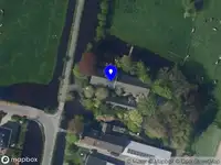 Ambulance met grote spoed naar de Spoelwijkschedijk in Boskoop