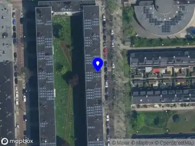 Ambulance met grote spoed naar de Gulden Winckelplantsoen in Amsterdam