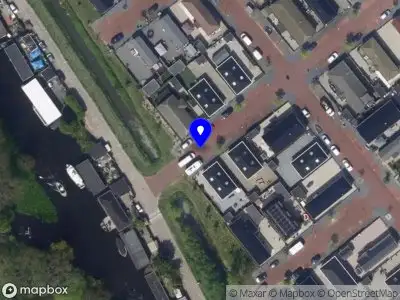 Ambulance met gepaste spoed naar de Rollemanstraat in Leiden
