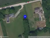 Brandweer met gepaste spoed naar de Kalverstraat in Roosendaal vanwege een buitenbrand