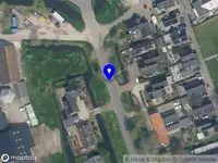 Ambulance met grote spoed naar de Nicolaas van Catsweg in Lopik