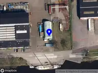 Ambulance en brandweer met grote spoed naar de Haven Noordzijde in Scheemda