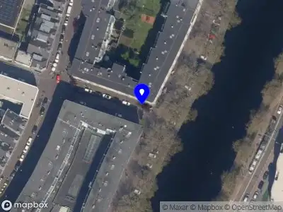 Ambulance met grote spoed naar de Zaagmolenkade in Rotterdam