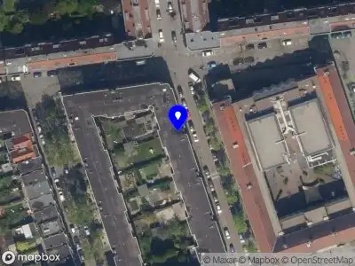 Ambulance met gepaste spoed naar de Middenhoefstraat in Rotterdam