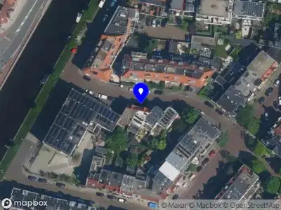 Ambulance en brandweer met grote spoed naar de Cruquiusstraat in Haarlem vanwege gebouwbrand