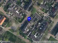 Brandweer met gepaste spoed naar de Sluisstraat in Assen vanwege een liftopsluiting