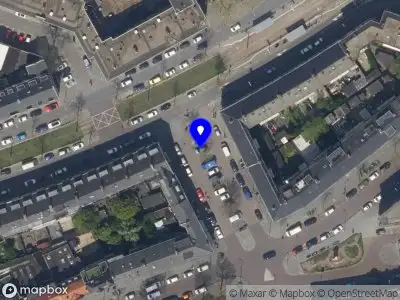 Ambulance met gepaste spoed naar de Zandblokstraat in Rotterdam