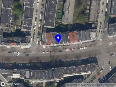 Ambulance met gepaste spoed naar de Vierambachtsstraat in Rotterdam