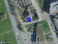 Politie naar de Arnoud van Gelderweg in Grave vanwege ongeval met letsel