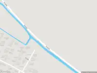 Brandweer met grote spoed naar de Gralda in Menaam vanwege gebouwbrand