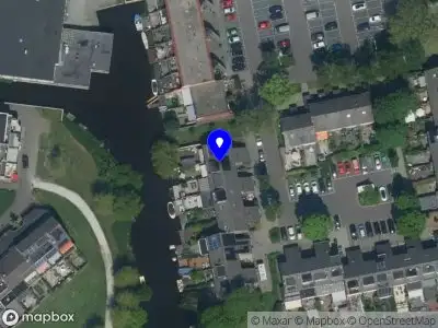 112 melding Ambulance met grote spoed naar de Grote Wetering in Zaandam