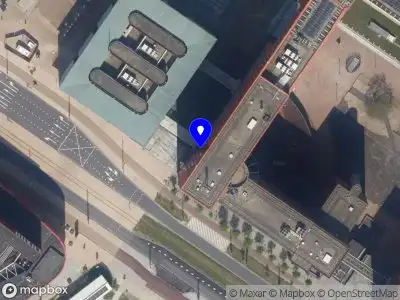 Ambulance met gepaste spoed naar de Wilhelminaplein in Rotterdam