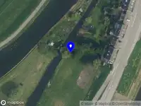 Ambulance met gepaste spoed naar de Sluisdijk in Gouda