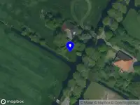 Ambulance naar de Oosterweg M in Purmer