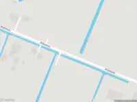 Ambulance met gepaste spoed naar de Starnmeerdijk in Starnmeer