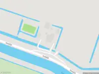 Ambulance met gepaste spoed naar de Oostdijk in Driehuizen