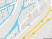 Ambulance met gepaste spoed naar de Rhijnspoor in Capelle aan den IJssel