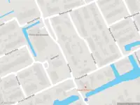 Ambulance met grote spoed naar de Kerkweg in Brandwijk