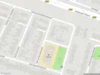 Brandweer met grote spoed naar de Sloet van de Beelestraat in Roermond vanwege gebouwbrand